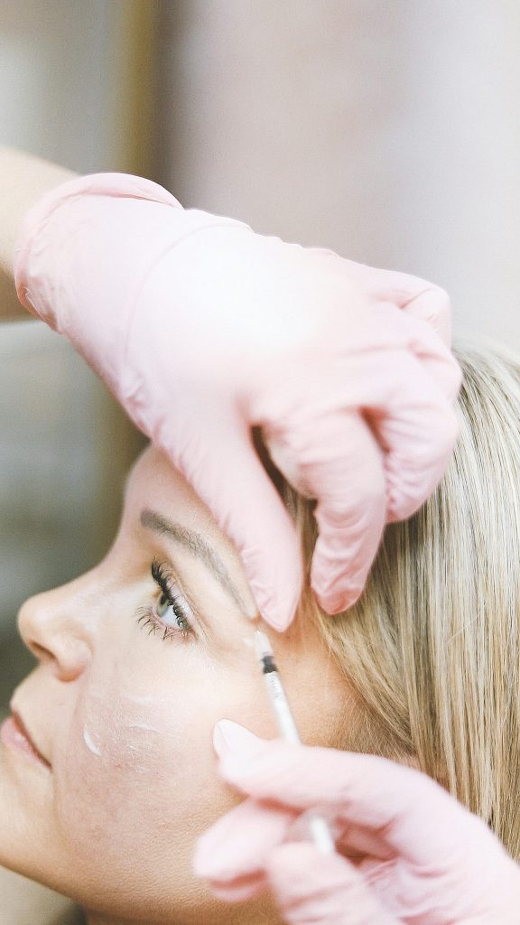 Close-up of a cosmetic treatment with injection at a modern beauty clinic.
